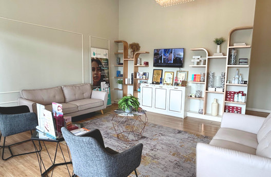 Wellness lounge with sofa and plants